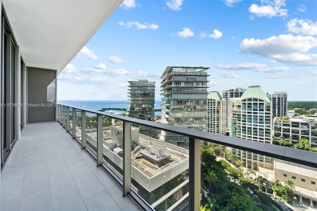 balcony featuring a water view