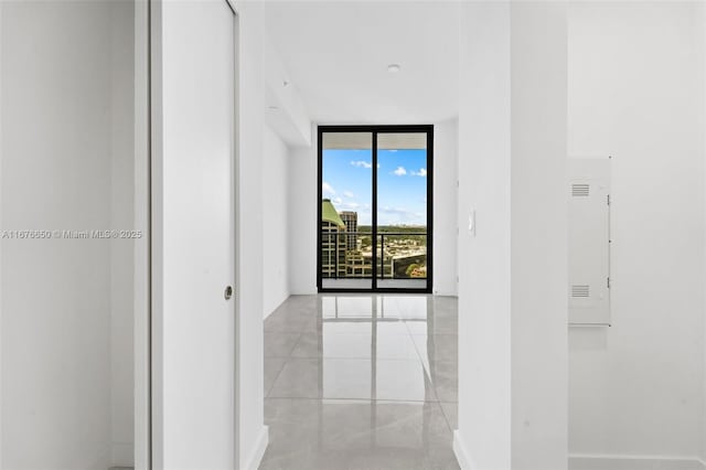 hallway with a wall of windows