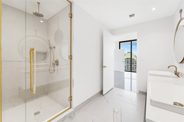 bathroom with double vanity, visible vents, marble finish floor, and a stall shower