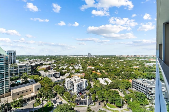 birds eye view of property with a city view