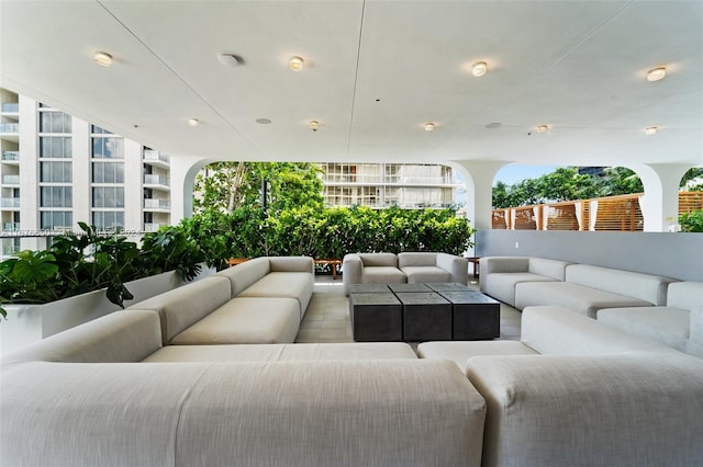 view of patio with a balcony and an outdoor living space