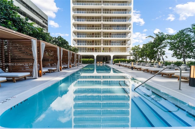 view of swimming pool featuring a patio area