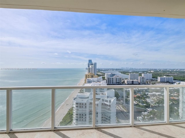 balcony featuring a water view