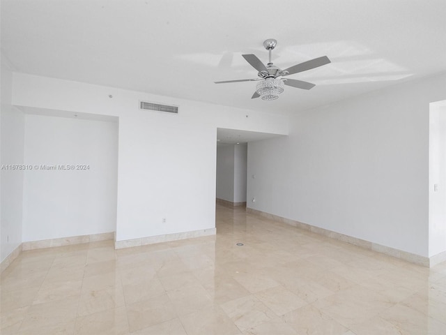 unfurnished room featuring ceiling fan