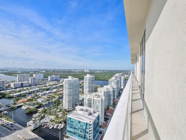 balcony featuring a water view