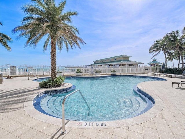 view of swimming pool featuring a patio