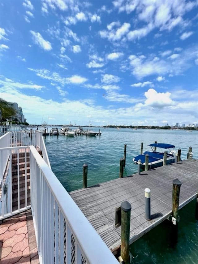 view of dock with a water view