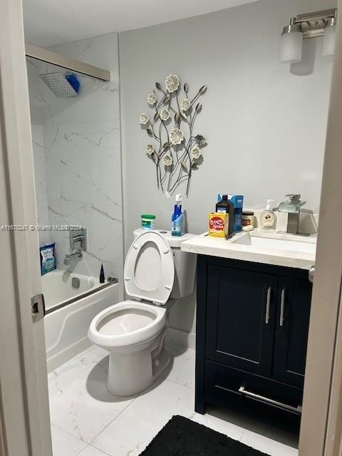 full bathroom with vanity, tiled shower / bath combo, and toilet