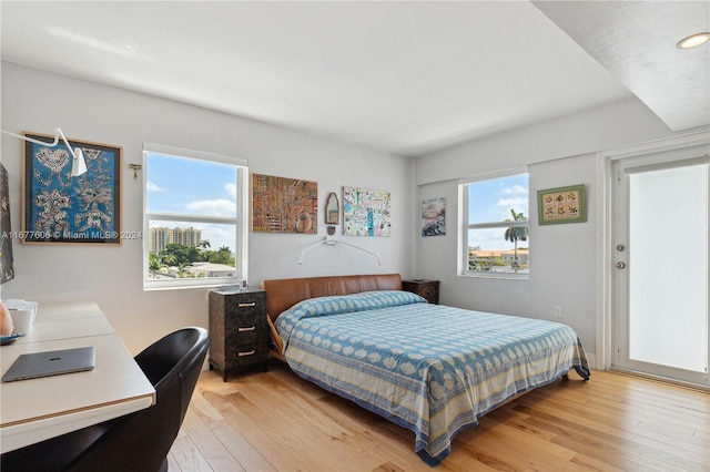 bedroom with light wood-type flooring