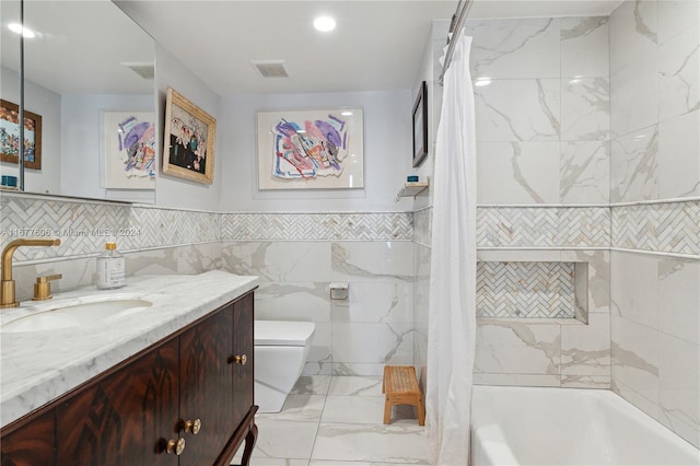 full bathroom with toilet, shower / tub combo with curtain, vanity, and tile walls