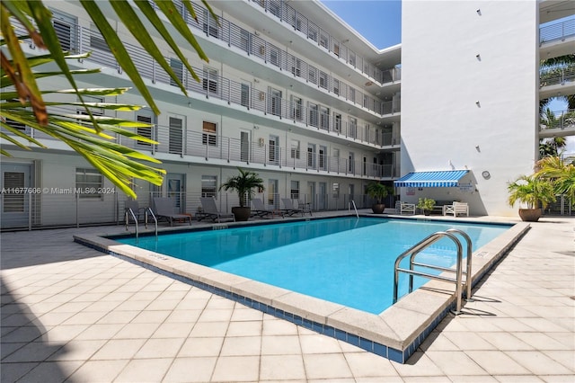 view of pool with a patio