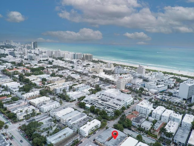 bird's eye view featuring a view of city and a water view