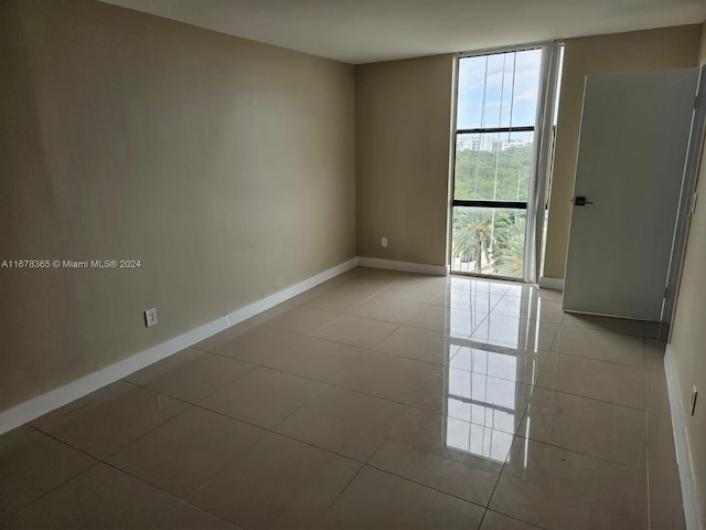 view of tiled spare room