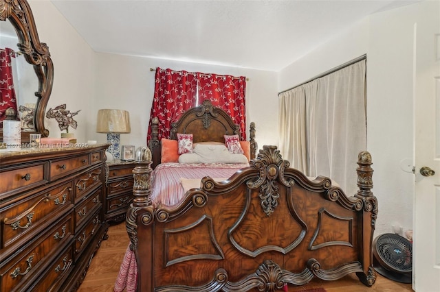 bedroom featuring parquet flooring