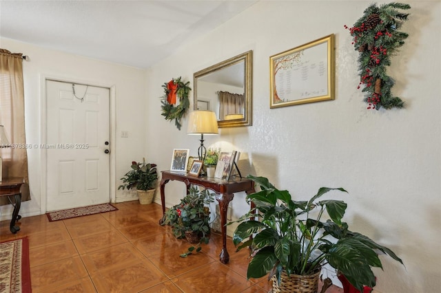 foyer with tile patterned flooring