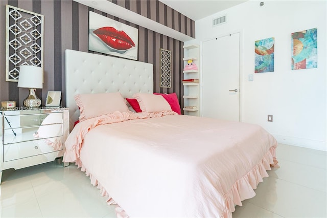 bedroom with tile patterned flooring