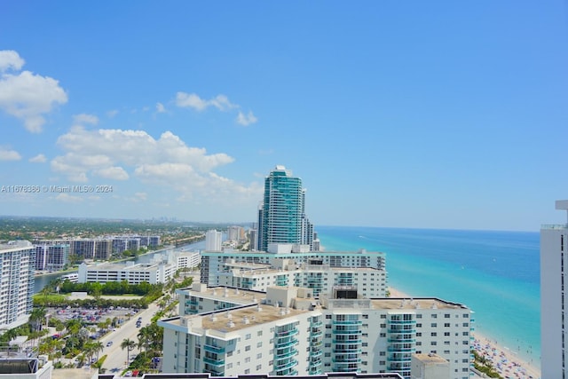 property's view of city with a water view and a view of the beach