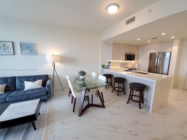 dining area with sink