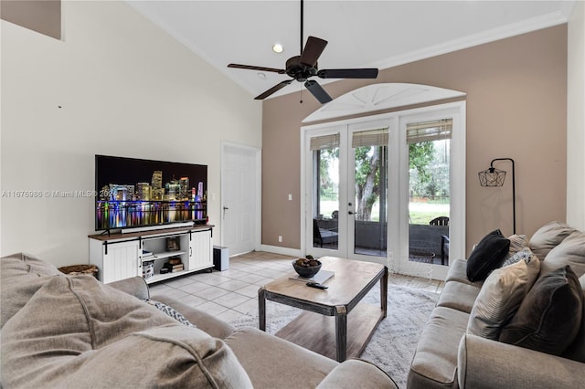 living room featuring ornamental molding, light tile patterned flooring, high vaulted ceiling, and ceiling fan