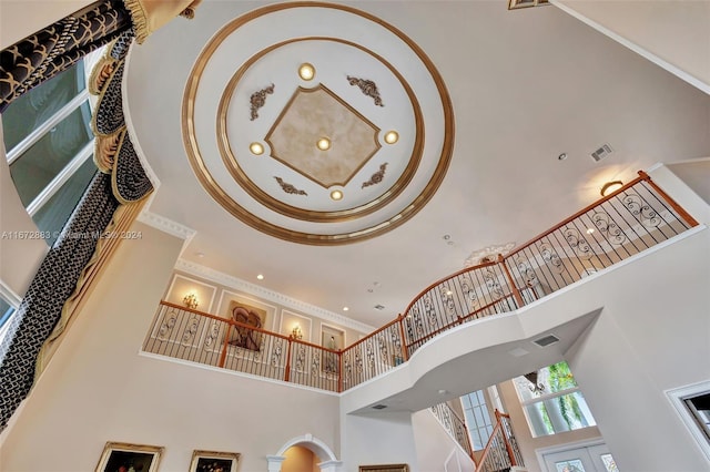 stairway with a high ceiling