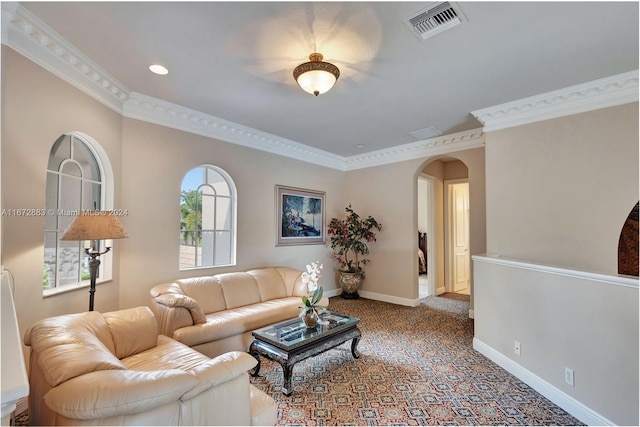 living room with carpet floors and ornamental molding