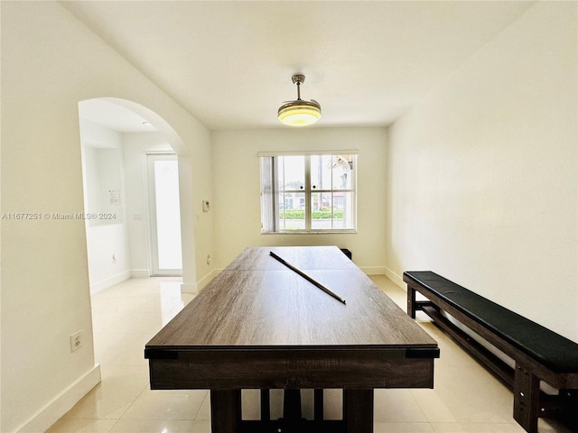 recreation room featuring light tile patterned floors