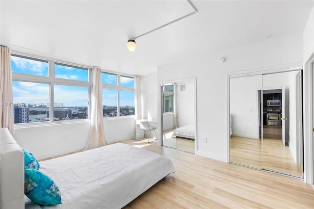 bedroom featuring light hardwood / wood-style floors