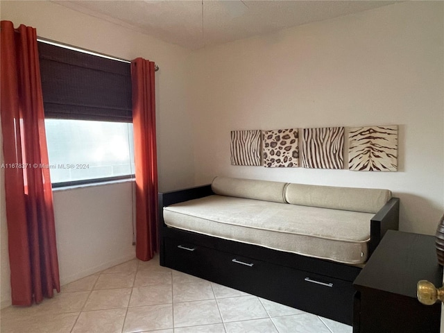 bedroom featuring light tile patterned floors