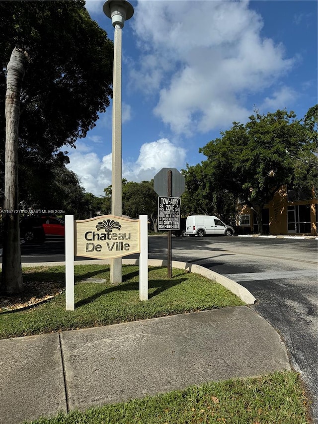 421 SE 10th St Unit A205, Dania Beach, FL 33004 - community sign featuring uncovered parking