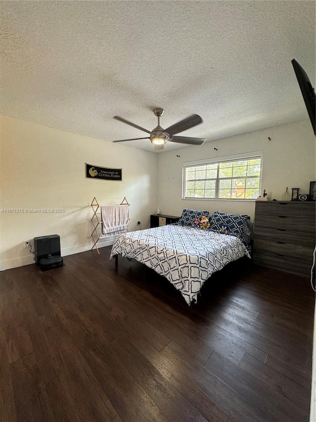 421 SE 10th St Unit A205, Dania Beach, FL 33004 - bedroom with wood finished floors, a textured ceiling, and ceiling fan