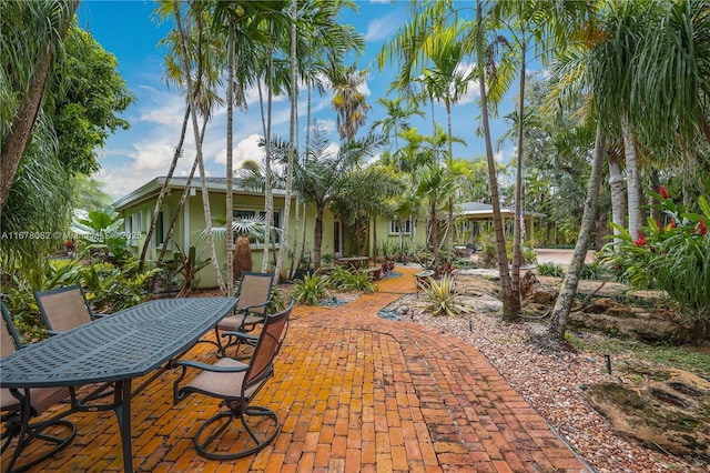 view of patio with a balcony