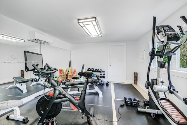 gym with a wall mounted air conditioner