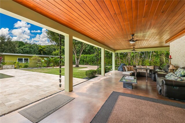 view of patio featuring outdoor lounge area and ceiling fan