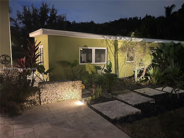 view of front of property featuring a patio area