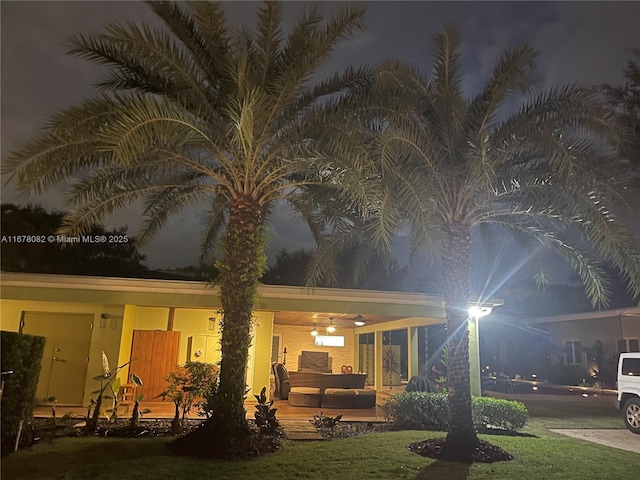 view of back house at night