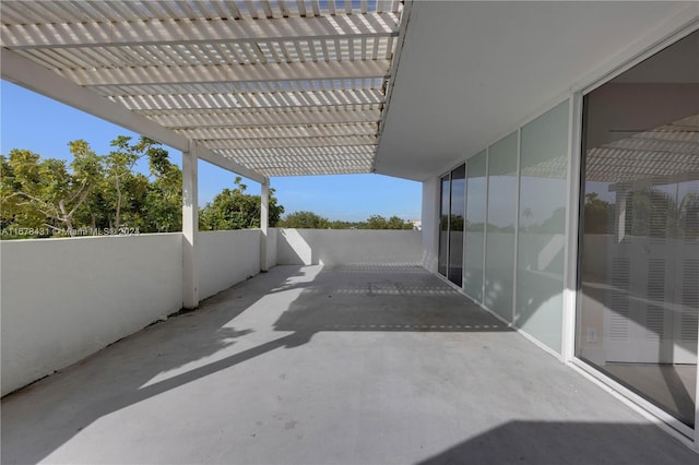 view of patio featuring a pergola