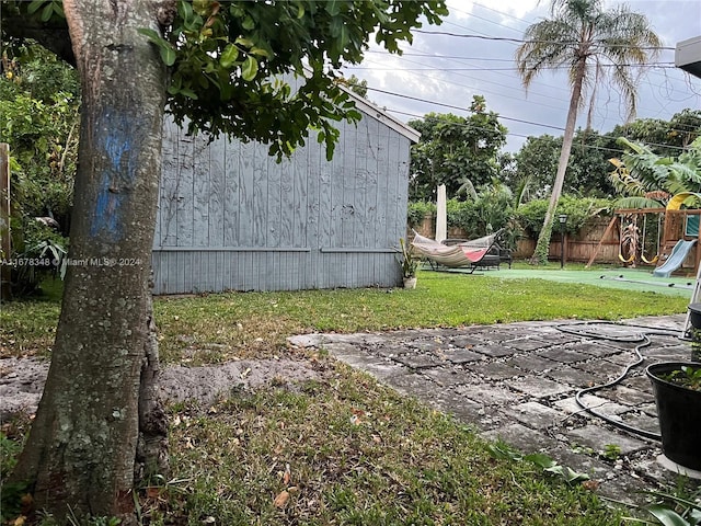 view of yard with a playground