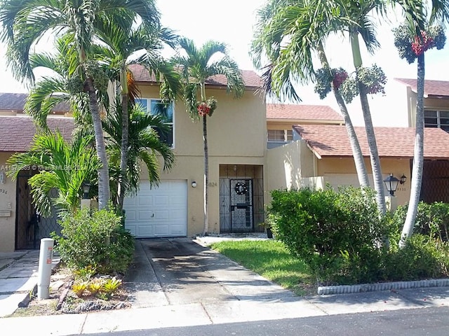 view of front of home with a garage