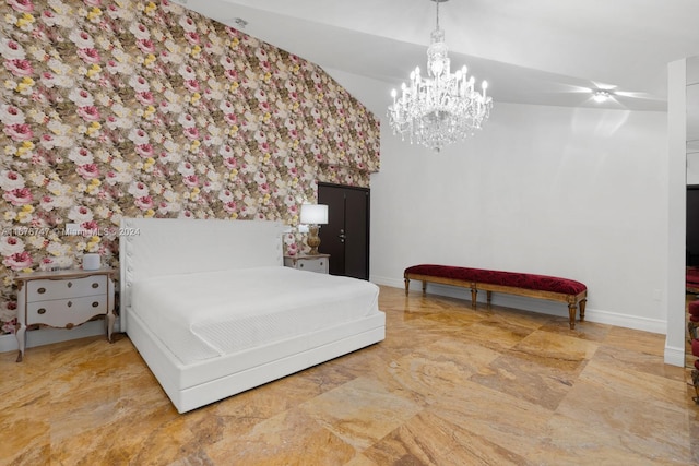 bedroom with a chandelier