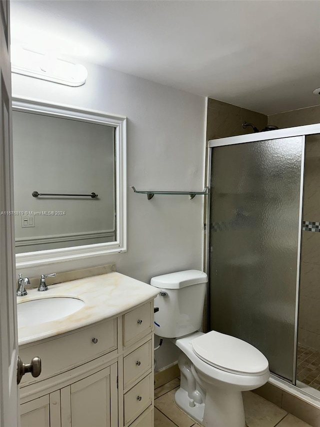 9200 W Atlantic Blvd Unit 1427, Coral Springs, FL 33071 - full bathroom featuring tile patterned flooring, a stall shower, and vanity