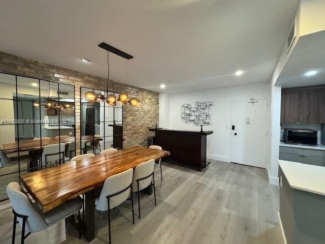 dining room with light hardwood / wood-style floors