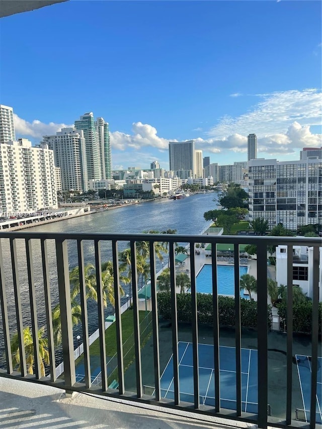 balcony featuring a water view