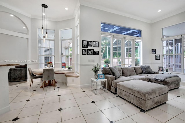 living room featuring crown molding and light tile patterned flooring