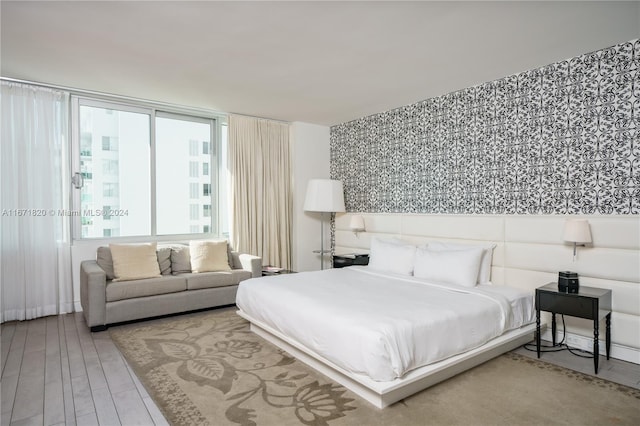 bedroom featuring hardwood / wood-style floors