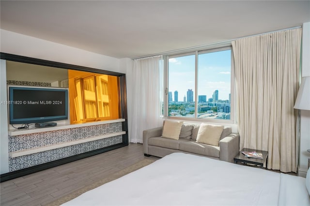 bedroom featuring hardwood / wood-style floors