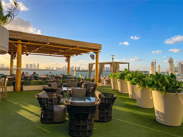 view of patio / terrace with a water view