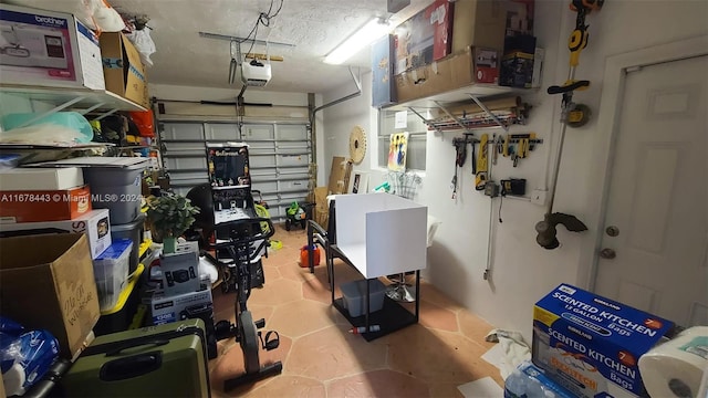 garage featuring a garage door opener