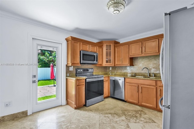 200 188th St, Sunny Isles Beach, FL 33160 - kitchen featuring stainless steel appliances, light stone counters, a sink, and tasteful backsplash