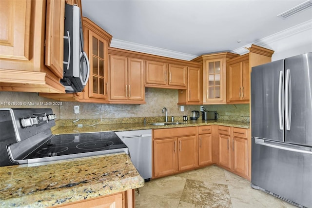 200 188th St, Sunny Isles Beach, FL 33160 - kitchen featuring crown molding, light stone counters, a sink, stainless steel appliances, and visible vents