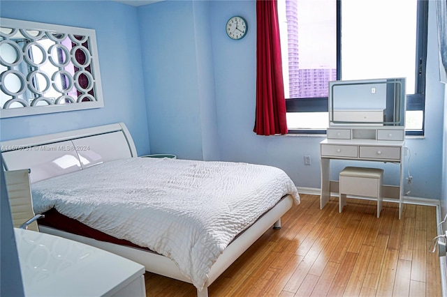 bedroom featuring wood-type flooring